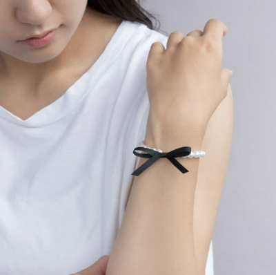 Vòng tay Osewaya ngọc trai đính nơ 99BL0542