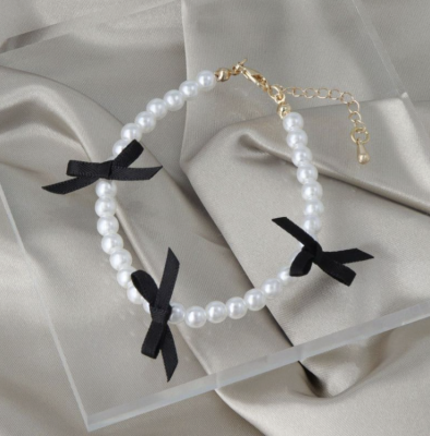 Vòng tay Osewaya ngọc trai đính ruy băng 99BL0541