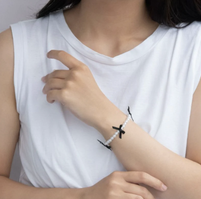 Vòng tay Osewaya ngọc trai đính ruy băng 99BL0541