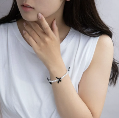 Vòng tay Osewaya ngọc trai đính ruy băng 99BL0541